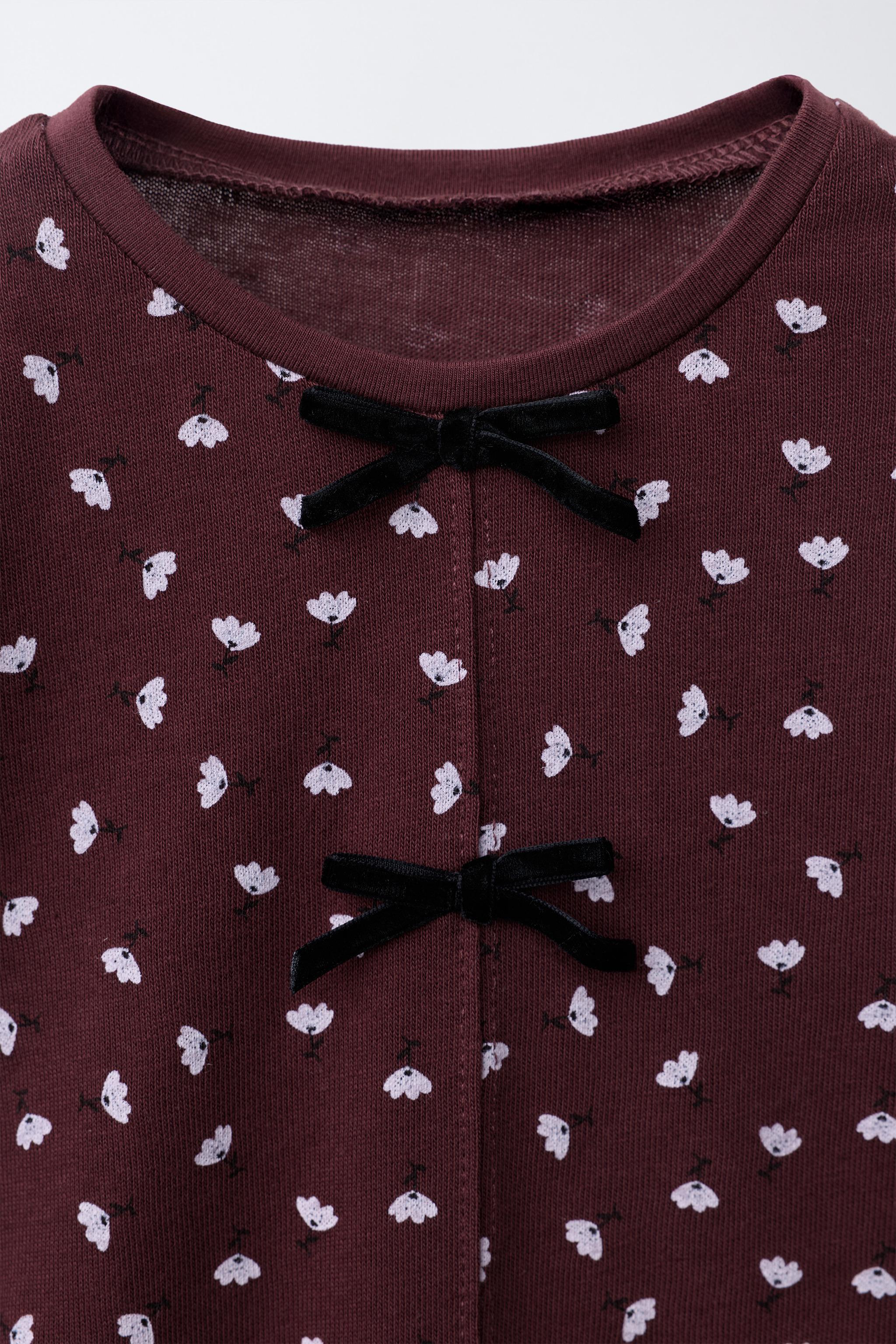 HAUT À FLEURS AVEC NŒUD EN VELOURS